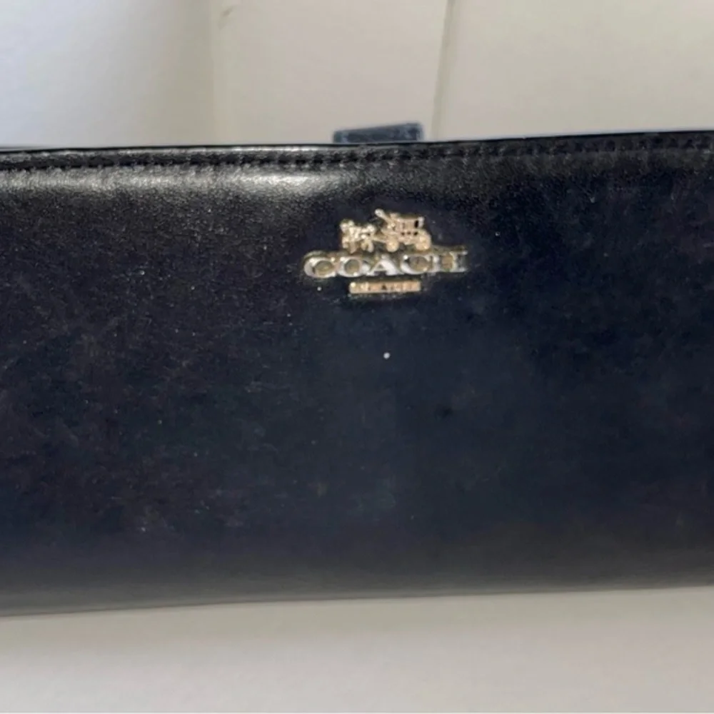 COACH Black leather skinny wallet